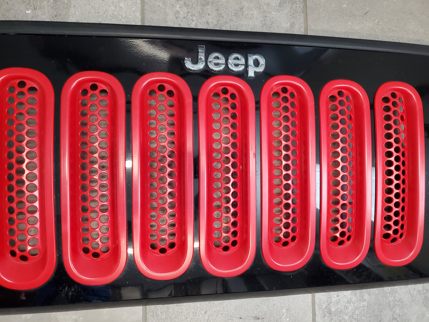 2007-2018 Jeep Wrangler JK Grille OEM Black With Red Inserts 1BM91TRM